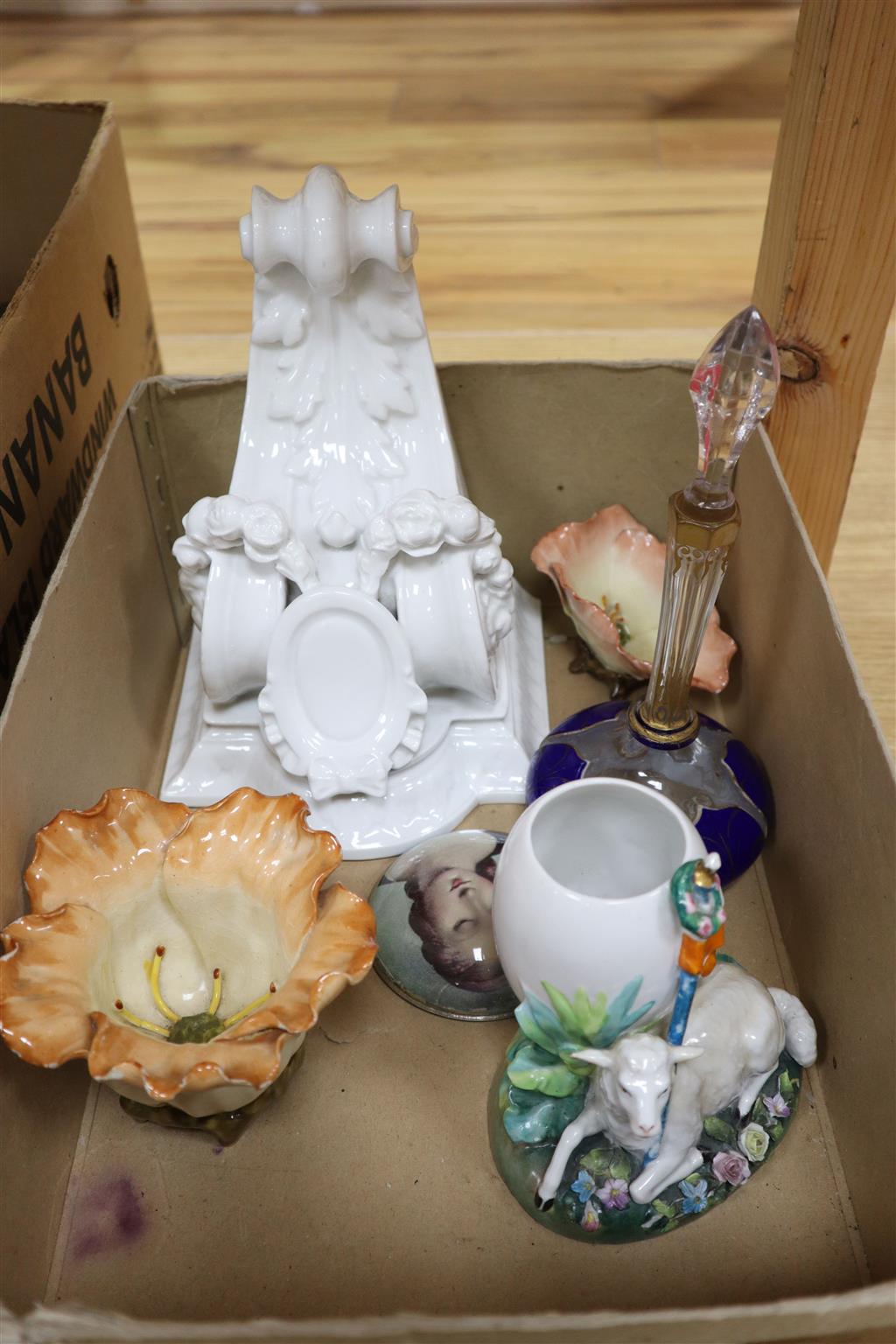 A white porcelain corbel, a pair of ivory-effect porcelain figures and five other items